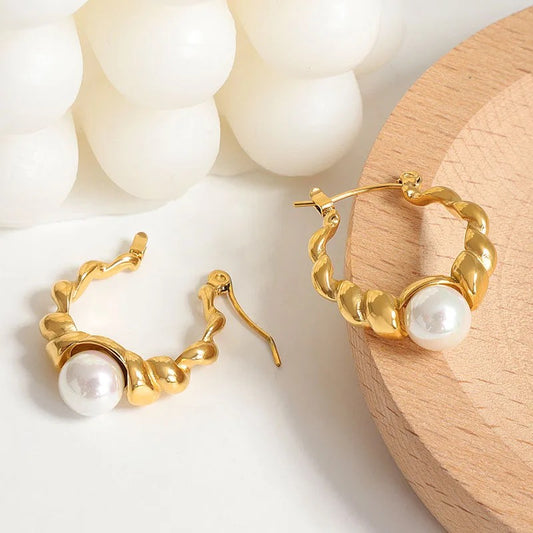 One pearl hoops